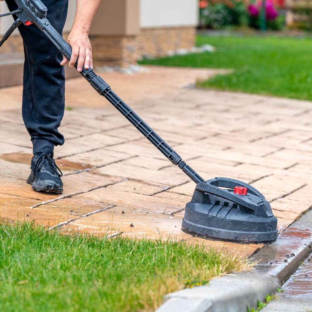 Cleaning the surface of interlocking pavers